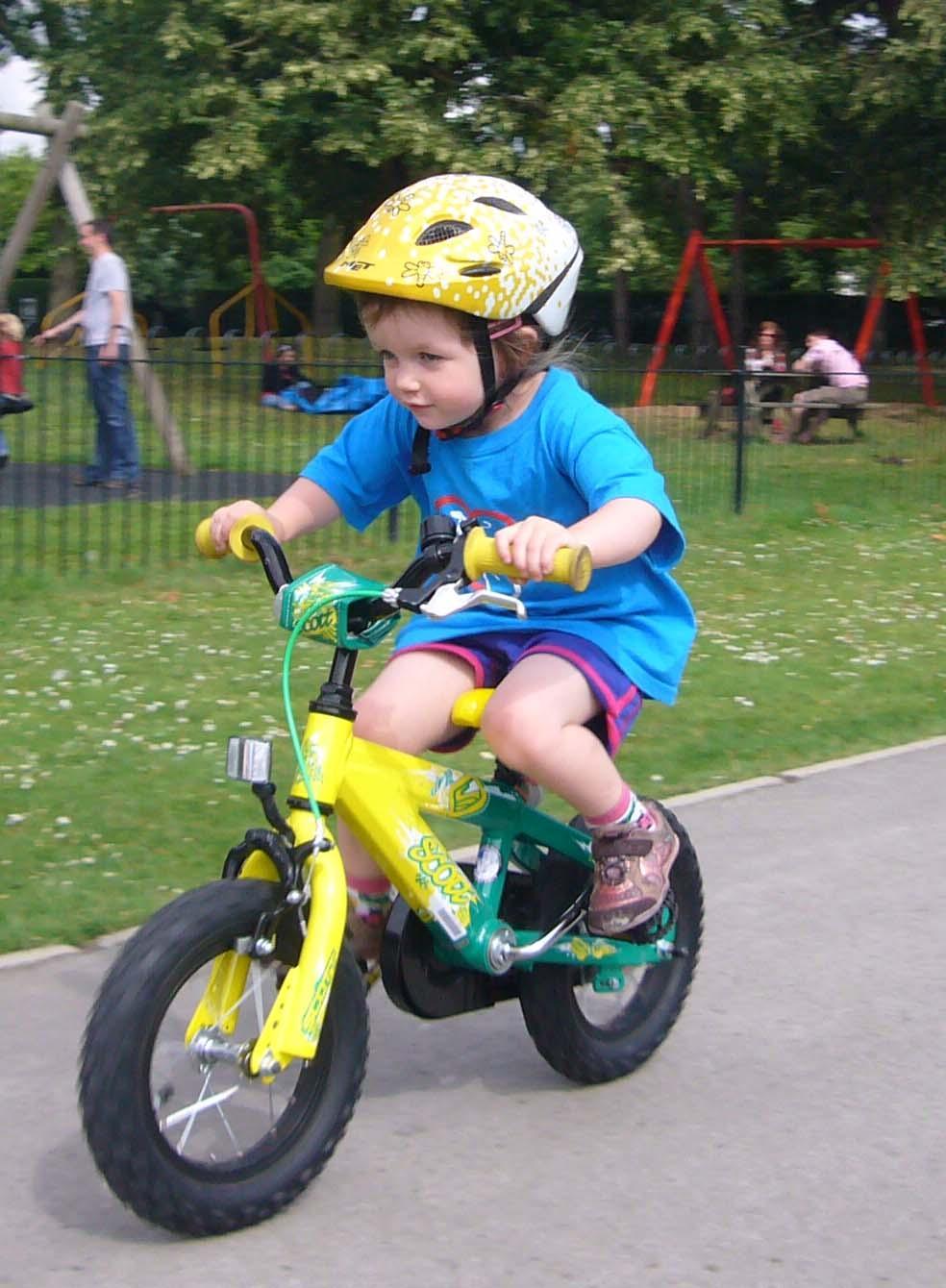 child riding bicycle